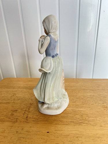Girl figurine with doves - with,